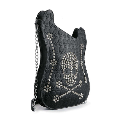 Rhinestone skull guitar shaped crossbody bag with chain strap and embossed skull texture in black biker glam style
