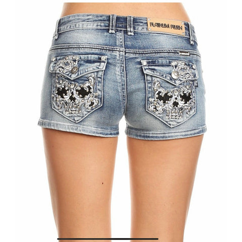 Shorts de mezclilla con adorno de diamantes de imitación y cabeza de calavera